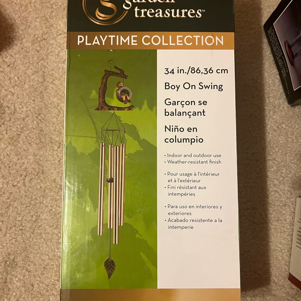34” Boy On Tire Swing Wind Chime new in seal